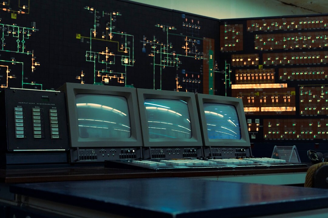 Broadcast control room with multiple video monitors showing live camera feeds